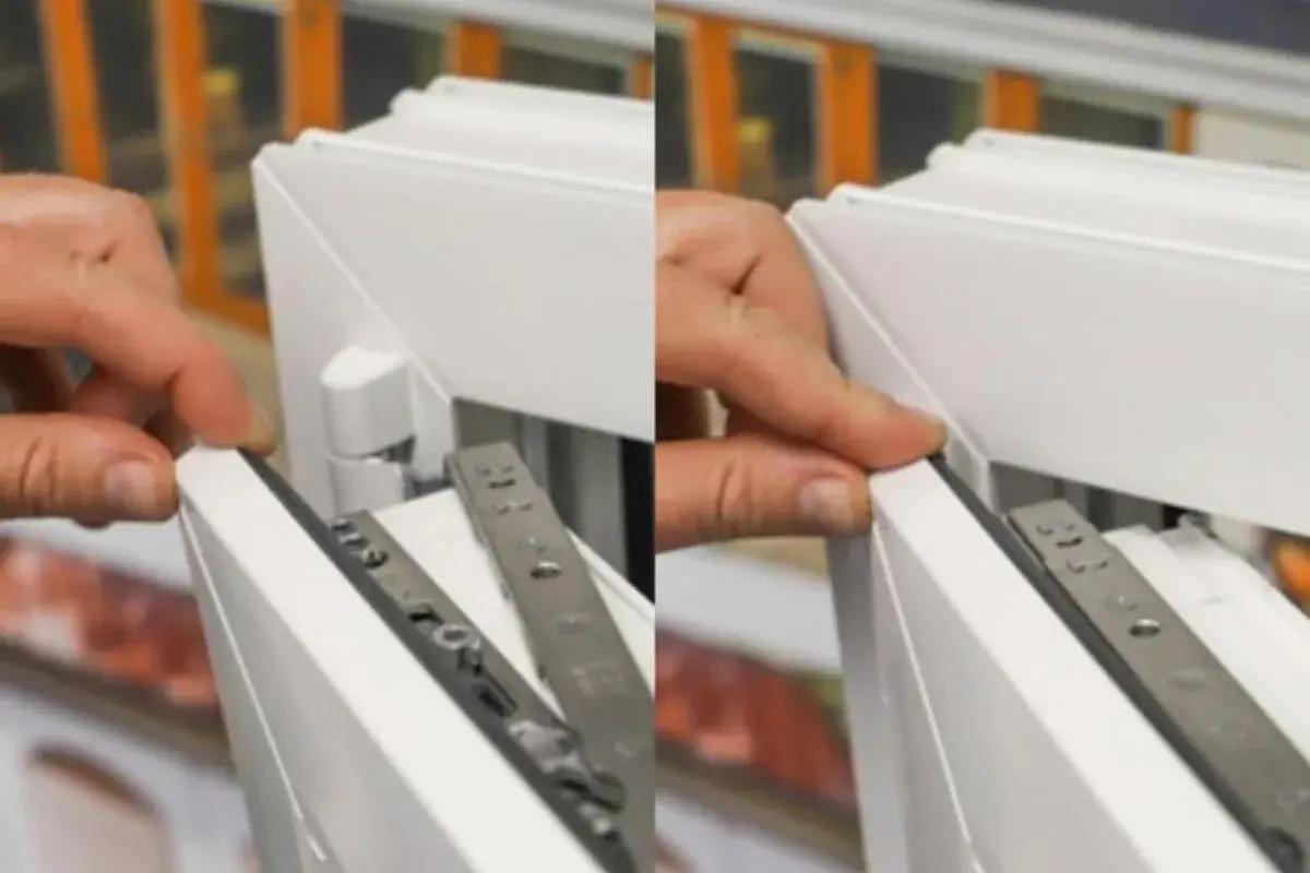 Main gauche ajustant un joint sur une fenêtre blanche, montrant le mécanisme de fermeture. La **fenêtre bloquée** semble être en cours d'installation ou de réparation.